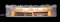 Schwibbogenerhöhung 'Mit der Bahn durchs Erzgebirge' verschneit, beleuchtet - 75x20x15 cm