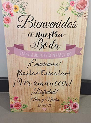 Cartel Bienvenidos a nuestra Boda flores con flores rosas y fondo de madera.