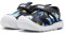 PUMA Mixte bébé Fun Racer Sandal AOP V INF Glissante, Black-Vivid Blue, 22 EU