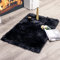 MIULEE Faux Fell Teppich Flauschig Weiche Warm Modern Bodenmatte Sofa Matte Kunstfell Dekofell Rechteck Bettvorleger Wolle Longhair Optik Gemütliches 60x90 cm Schwarz