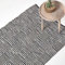 Homescapes Teppich aus 100% recyceltem Leder mit quadratischem Muster, 120 x 180 cm, schwarz-weiß