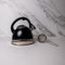 La Cafetière 2 L Steel Black Whistling Kettle and Stainless Steel Tea Strainer Set