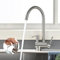Grifo de Cocina Moderno 2en1: Dispensador Jabón + Caño Giratorio 360° - BuntHaus Mezclador de Fregadero Acero Inoxidable 304 (No Necesita Taladro), Ahorra Espacio y Ahorro de Energía