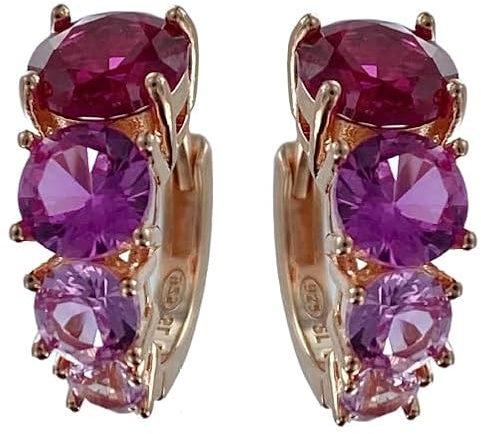 Eleganti orecchini a cerchio in argento 925 rosè con incassati zirconi di rossi/fucsia a misure digradanti. Diametro 1,4 cm Peso 3.2 gr