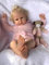 iCradle Reborn Puppen Kleinkind 24 Inch 60 cm die Aussehen wie echte Babys Neugeborene Baby Mädchen Puppe Realistische Gewichtete Weiche Körper Implantat Blonde Haar Puppen Für Kinder Alter 3+