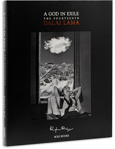 A GOD IN EXILE : THE FOURTEENTH DALAI LAMA [Hardcover] RAGHU RAI