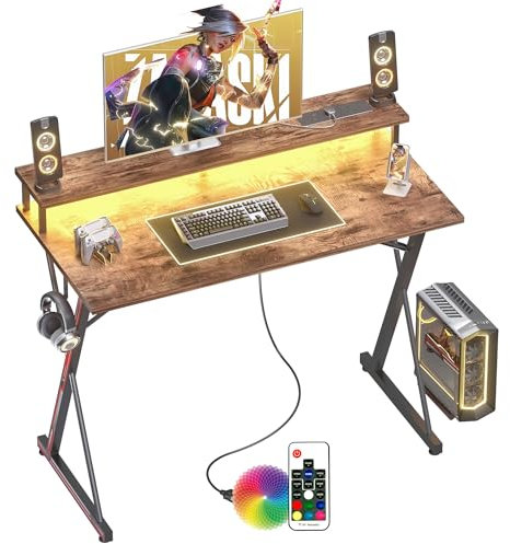 BEXEVUE Escritorio Gaming Regleta Enchufes LED - 100x50cm Escritorio Gamer Ergonómico, Grande Soporte Monitor, Mesa Moderna, Marco X, Gancho Auriculare, Estudio Juego Trabajo Dormitorio Oficina Hogar