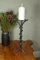 Beautiful Twist Wrought Iron Candlestick, hand forged from solid steel. Unique design by our in-house creative blacksmith Iain Wilson. Finished in a gunmetal grey finish.
