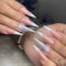 NICENEEDED 24 Pcs Long Stiletto Press on Nails, French White Tips False Nail, Glossy Nude Fake Nails with Glitter Sliver Sparkly Design, Acrylic Almond Arificial Nail for Women