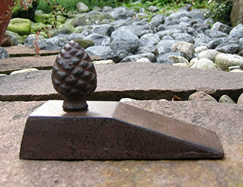 Cale de porte avec design pommes de pin en fonte - Élégance et fonctionnalité combinées