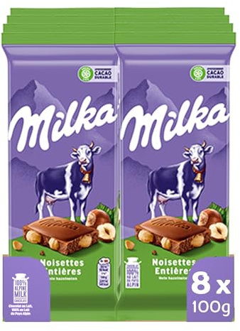 MILKA - 8 Tablettes de Chocolat au Lait Milka et Noisettes Entières 100g - Chocolat au Tendre Lait du Pays Alpin - Lot de Tablettes de Chocolat au Lait et Noisettes Entières - Lot de 8x100g