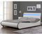 Corium LED Polsterbett Valencia Wellenförmiges Doppelbett mit LED Beleuchtung aus Kunstleder Lattenrost & gepolstertes Kopfteil 140x200cm Weiß mit schwarzer Kante