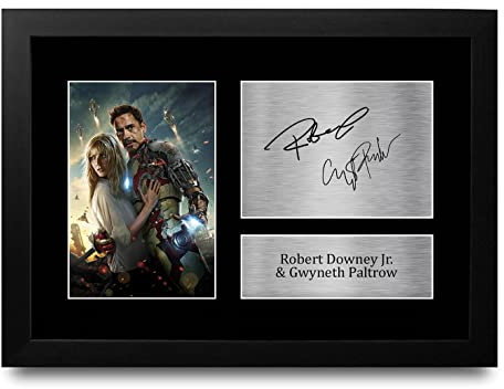 HWC Trading FR A4 Robert Downey Jr & Gwyneth Paltrow Iron Man Iron Man & Pepper Potts Geschenke Geducktes Signiertes Autogramm Foto für Fans von Film Memorabilien - A4 Gerahmt