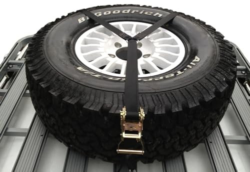 Cinta blocca ruota di scorta a 3 punti con cricchetto tensore e cinta nera, adatto per ruote con diametro da 40 a 120 cm.