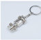 SUNSHINETEK Porte-clés de voiture de course porte-clés en métal pour clés de voiture ou de maison Cool porte-clés cadeau pour hommes ou garçons (argent, paquet de 2)
