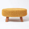 Homescapes niedriger runder Strick Sitzhocker mit Holzbeinen, Senf Fußhocker 62 x 62 x 30 cm, Strickhocker mit grob gestricktem Bezug aus 100% Baumwolle
