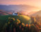 adrium Acryl-Bild 70 x 50 cm: Luftaufnahme einer kleinen Kirche im Nebel und farbenfrohen Wald bei Sonnenaufgang (210385268)