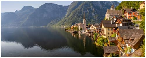 Wallario Memoboard aus Glas mit Motiv, Magnet-Tafel in 32 x 80 cm in Premium Qualität Malerisches Dorf an Bergsee