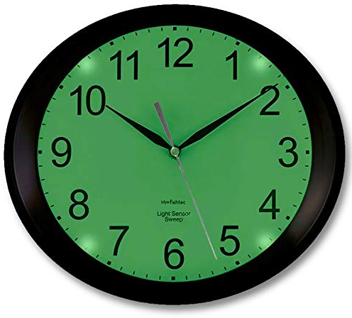 FISHTEC Horloge Murale Ovale Luminescente avec Rétroéclairage 4 LED Vertes - Détecteur d'obscurité - Silencieuse sans Tic Tac - 3 Modes d'Eclairage : Permanent/Désactivé ou Auto - 30 CM - Noir
