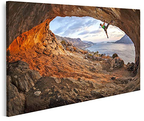 islandburner Bild auf Leinwand Mann Klettern auf dem Dach der Höhle bei Sonnenuntergang Bilder Drucke Kunst Poster Wandbild