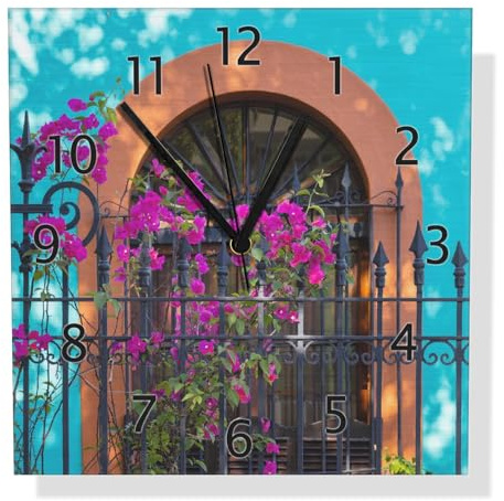 Wallario Design Wanduhr Pinke Blumen vor türkisfarbener Fassade aus Aluverbund, Alu-Uhr Größe 30 x 30 cm, Schwarze Zeiger mit Metalloptik