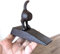 Dog Tail Cast Iron Metal Doorstopper Heavy Door Wedge Shabby Chic Stopper