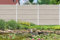 Gartenwelt Riegelsberger WPC Steckzaun Sichtschutz Zaun Gartenzaun Komplettset | 3 Zaunelemente 180x180 cm sand + 4 Pfosten silber | zum Festschrauben