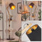 HOFSTEIN Tukchor Lampadaire réglable en bois/métal/tissu noir/naturel/noir/doré au design bohème avec étagères et interrupteur, 152,5 cm, E27, salon, chambre à coucher, salle à manger