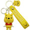 AUTOZOCO Porte-clés Winnie l'Ourson en Silicone, Figurine Caoutchouc, 6,5 cm, Jaune, Citronier