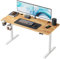 FEZIBO 110 x 55cm Electric Height Adjustable Standing Desk, Home Office Table with Splice Board, Light Brown