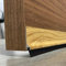 BURCASA - Burlete para puerta de PVC rigido ROBLE de 1 metro y fleco de 12mm. Fijación adhesiva de doble cara resistente.