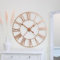 Melody Maison Large Rose Gold Roman Numerals Wall Clock 80x80cm Indoor/Outdoor, Open Face Skeleton Clock