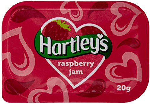 Hartley's Raspberry Jam (Pack of 100) | Individual single-serve pots reduce waste and ensure easy portion control for busy catering or hospitality service.