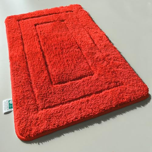 KARAT Badteppich Atlantis - extra flauschig & schnelltrocknend - Badezimmerteppich mit rutschsicherer Rückseite - Badematte Duschvorleger (Rot, 40 x 60 cm)