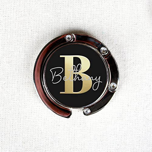 eBuyGB Personalised Foldable Purse Hook, Folding Monogram Handbag Table Hanger, Portable Bag Hanger, Desk Hooks - Initial & Name (Black)