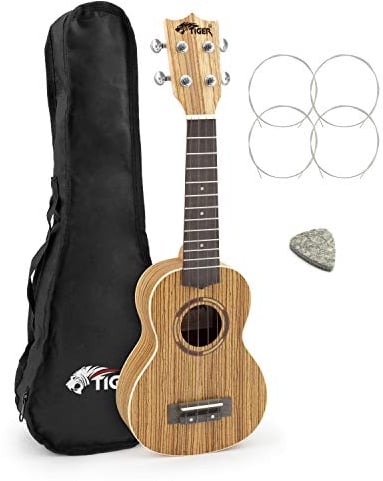 TIGER UKE14-ZB Sopran-Ukulele aus Zebraholz, mit Carbon-Saiten, Gigbag, Ersatzsaiten und Filzplektrum.