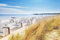 adrium AluVerbund-Bild 90 x 60 cm: Blick von einer Düne an Strandstühlen (14232735)