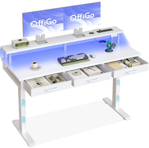 OffiGo Electric Standing Desk, 140 x 54cm Height Adjustable Desk with 3 Drawers, RGB LED Strip & Charging Station for Home Office Computer Workstation, Computer Table with Monitor Stand, White