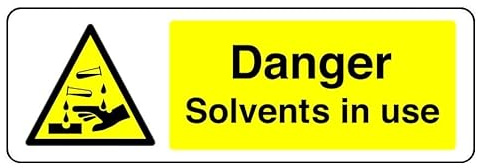 Danger Solvents In Use - safety sign - High tack self-adhesive sticker (450mm x 150mm) Viewing Distance within 7m.