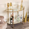 Melody Maison Gold Mirrored Oval Drinks Trolley