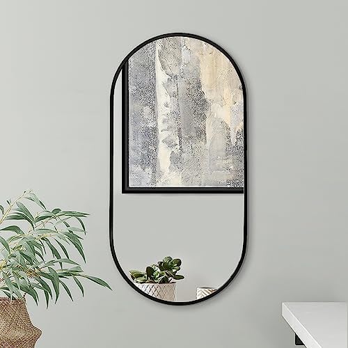 Americanflat 61x31 cm - Espejo Ovalado de Pared - Espejo Decorativo para Baño, Recibidor, Tocador y Salón - con Marco de Aluminio Delgado, Color Negro
