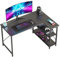 Bestier Computertisch 120CM Gaming Schreibtisch L Form Gaming Tisch mit Regal Verstellbare Höhe Kleiner Eckschreibtisch mit Ablagefächern für Heimbüro Stärker X Form Halterung Kohlefaser