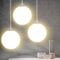 BAKAJI Lustre lampe suspension douille sphérique en verre mat support en métal chromé design moderne culot E27 ampoule max 40 W éclairage décoration maison (25 cm)