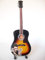 Guitare miniature acoustique en hommage à Johnny Hallyday