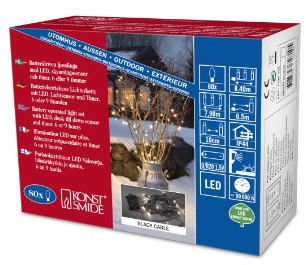 Konstsmide 3728-100 LED Lichterkette / für Außen (IP44) / Batteriebetrieben: 2xD 1.5V / mit Schalter, Lichtsensor und 6h u. 9h Timer / 80 warm weiße Dioden / schwarzes Kabel, warmweiß, 80 LEDs