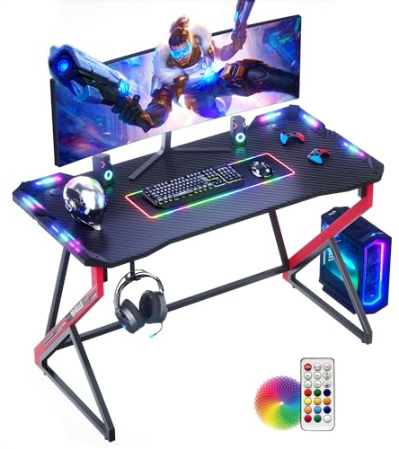BEXEVUE Scrivania Gaming con LED - 120x60cm Tavolo Gamer Computer Ergonomica, Telaio Z Fibra di Carbonio Stabile Facile da Montare, Grande Postazione Desktop, Gancio Cuffie per Giocare Studiare Lavoro
