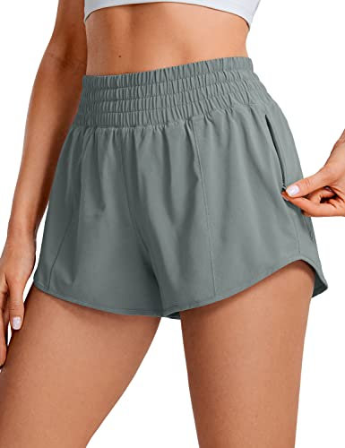 CRZ YOGA Damen High Waist Running Shorts Gym Sporthose Mesh Innenhose Schnelltrocknend Kurz Hose mit Zip Tasche - 6.4cm Grauer Salbei 38