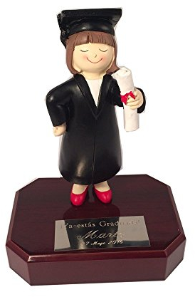 Figura de graduada sobre peana de Madera, con Placa grabada con la dedicatoria Que indiques