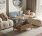 Table basse convertible en noyer avec plateau relevable et extensible pouvant accueillir jusqu'à 6 personnes