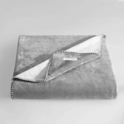 Calvin Klein - Throw Blanket, Reversible Premium Plush Bedding with Whipstitch Detailing, Practical Luxury Bedding Essentials (Modern Reversible Solid Grey, 50 x 70)